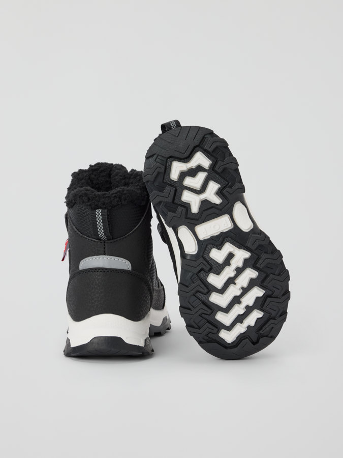 Vedenpitävät topatut talvikengät Vedenpitävät topatut talvikengät