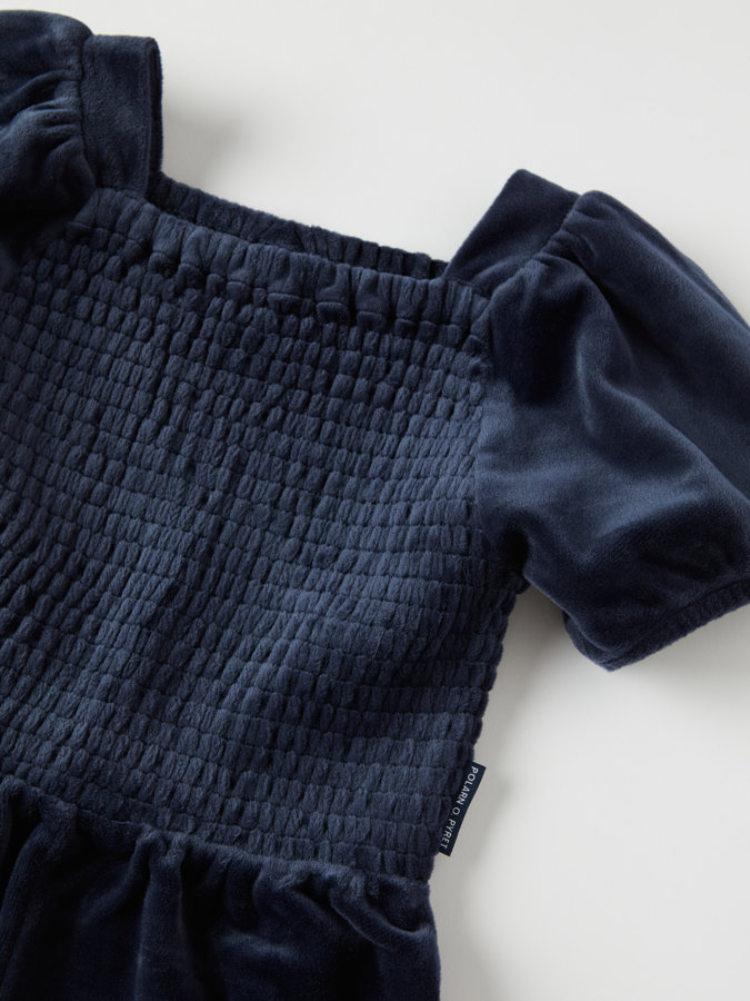 Haalari puhvihihoilla Haalari puhvihihoilla