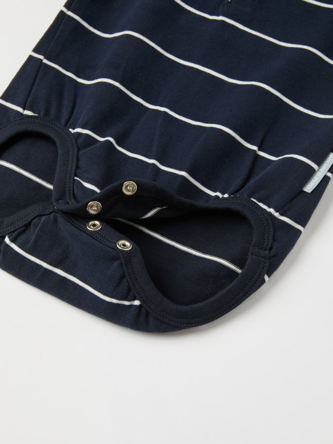 Raidallinen body kauluksella Raidallinen body kauluksella