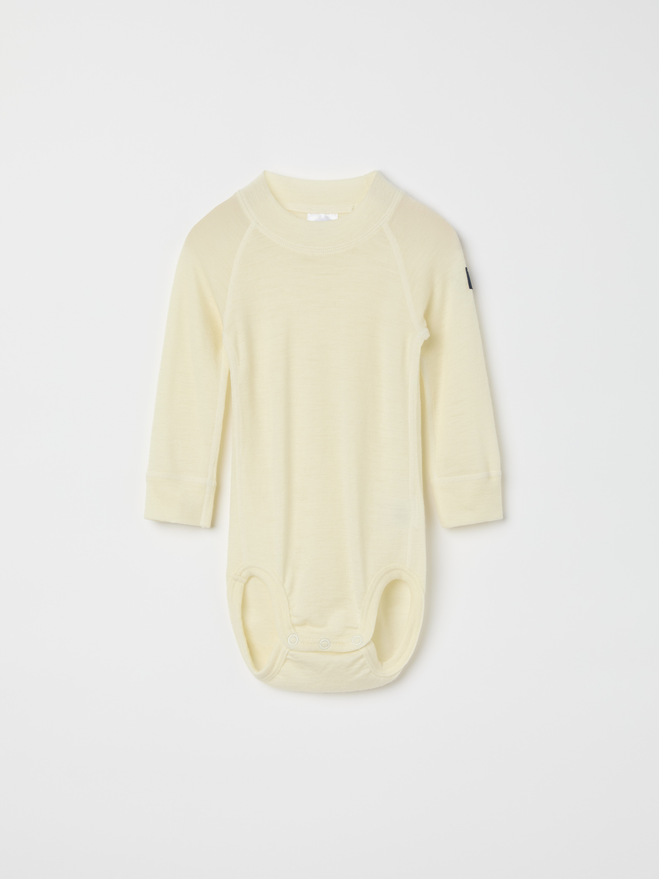 Yksivärinen pitkähihainen body merinovillaa