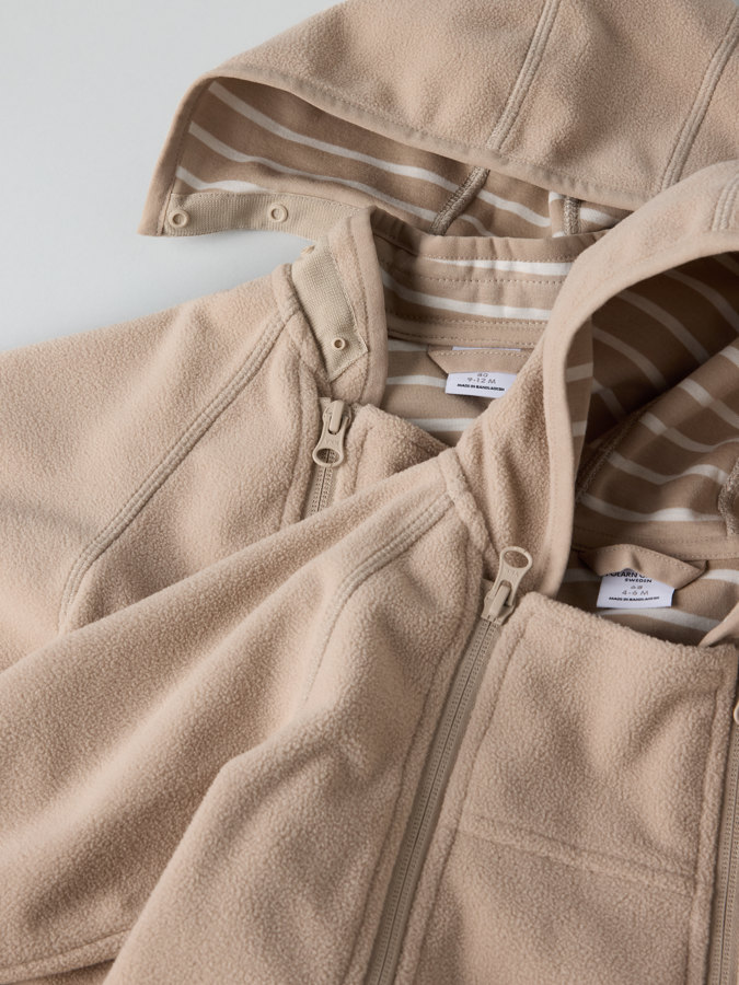 Tuulenpitävä windfleece-haalari Tuulenpitävä windfleece-haalari