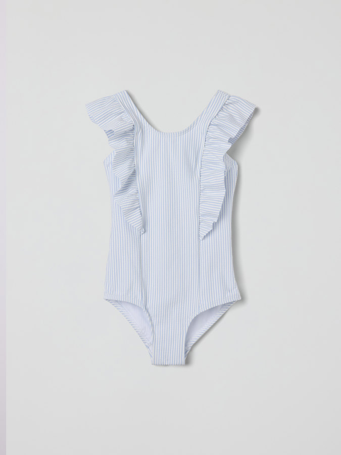 Raidallinen uimapuku Raidallinen uimapuku