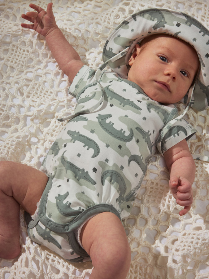 Lyhythihainen body krokotiilikuviolla Lyhythihainen body krokotiilikuviolla