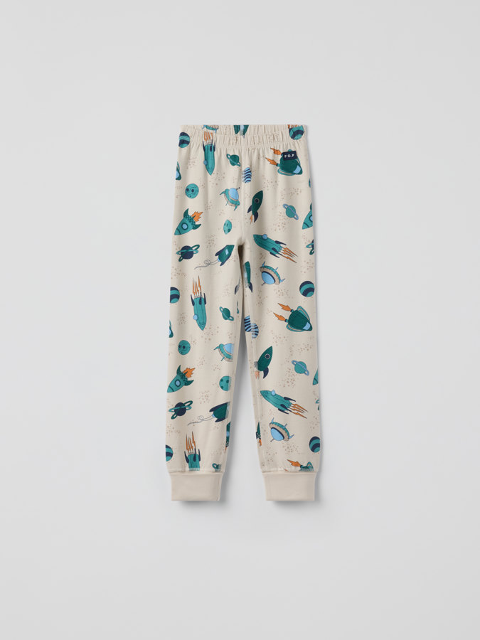 Kaksiosainen pyjama avaruusaluskuviolla