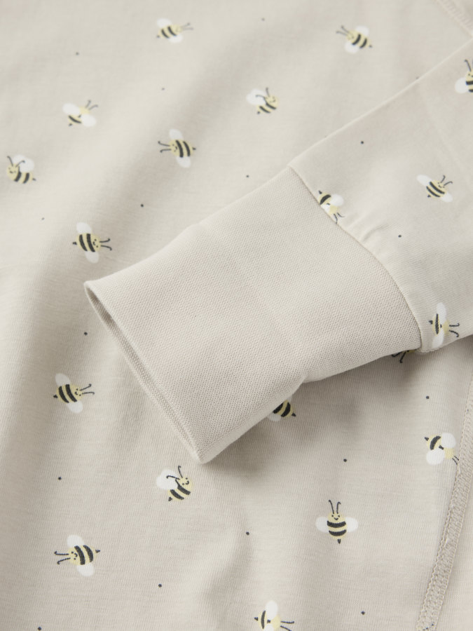 Pidennettävä body mehiläiskuviolla