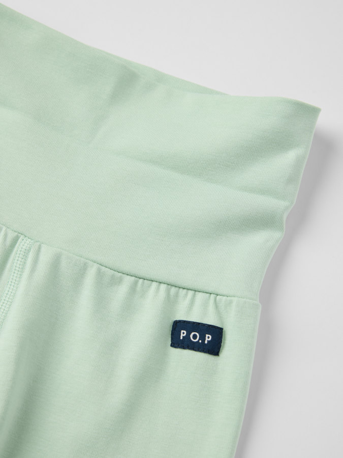 Yksiväriset housut taitettavilla resoreilla