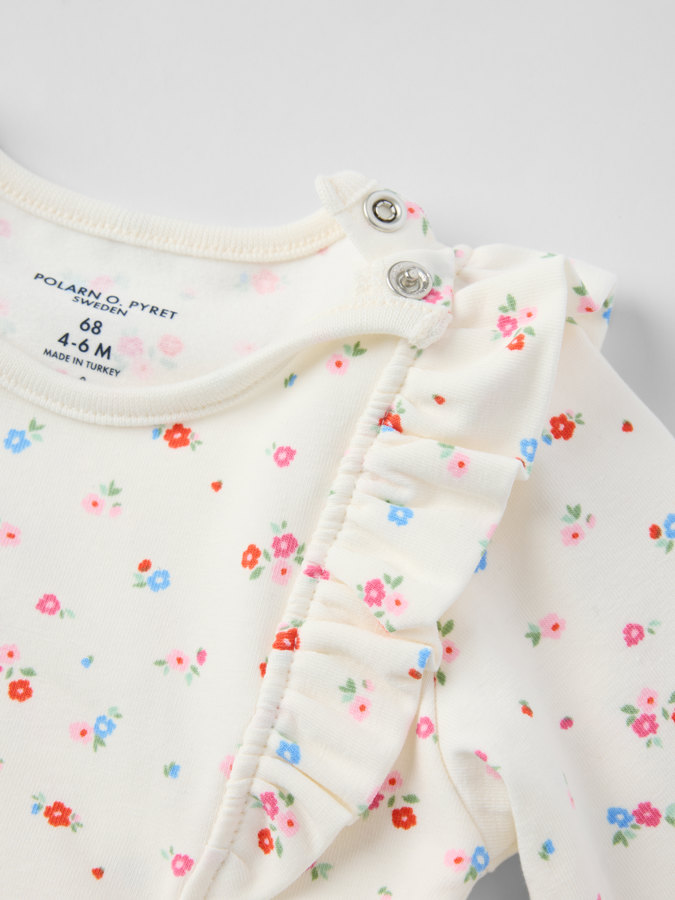 Pitkähihainen body kukkakuvio Pitkähihainen body kukkakuvio