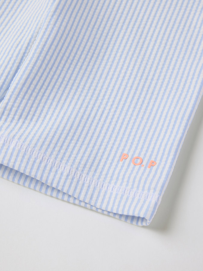 Raidalliset UV-shortsit