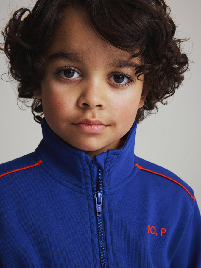 Vetoketjullinen collegepaita