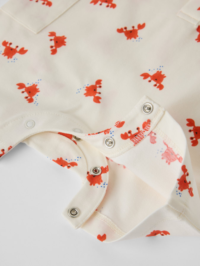 Lyhythihainen jumpsuit ravut