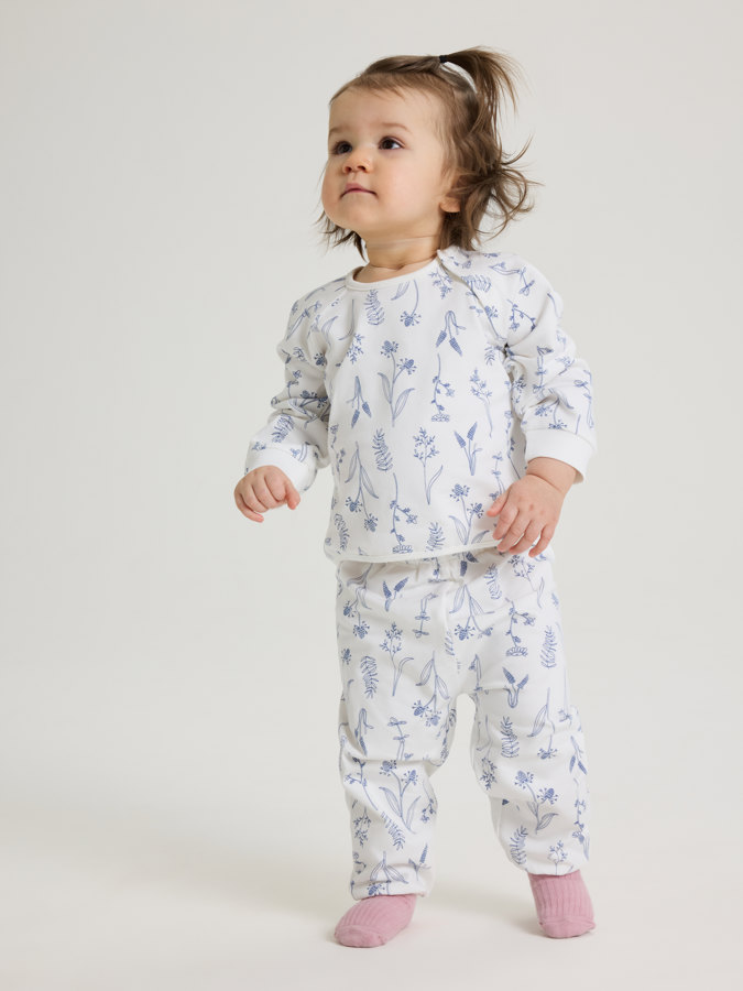 Collegehousut kukkakuviolla Collegehousut kukkakuviolla