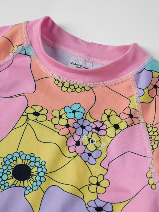 Pitkähihainen UV-paita kukkakuviolla Pitkähihainen UV-paita kukkakuviolla