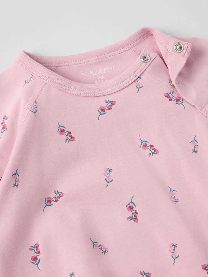 Pidennettävä body kukallinen Pidennettävä body kukallinen